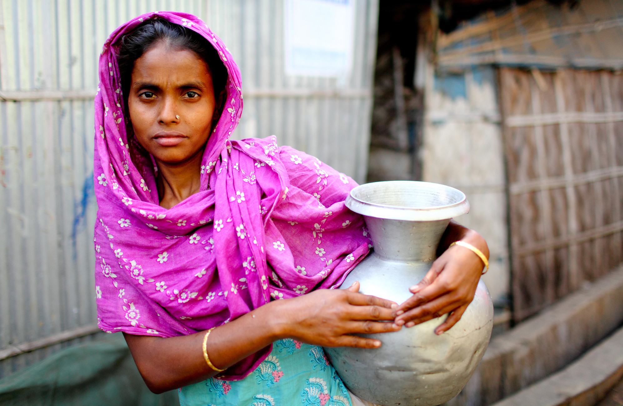 Nasima Akter in Kalshi slum, Mirpur, Dhaka Collecting water in Dhaka