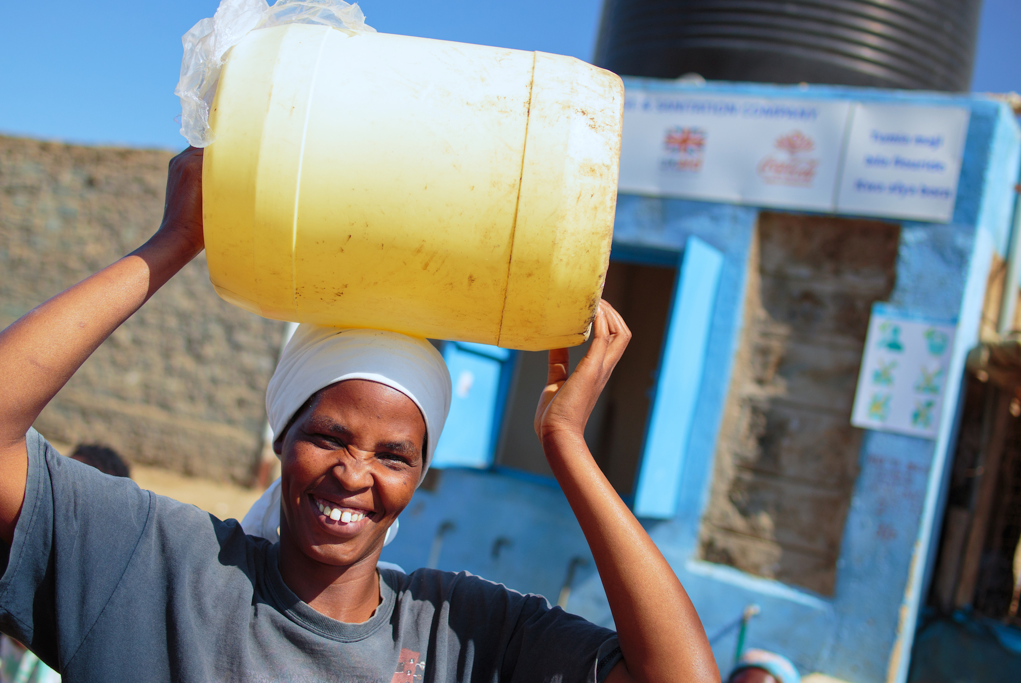 Water kiosk operator in Naivasha_ Kenya
