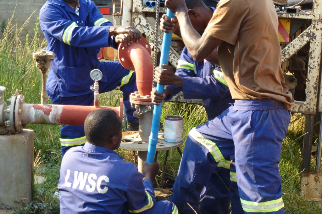 LWSC installing dip tubes & data loggers