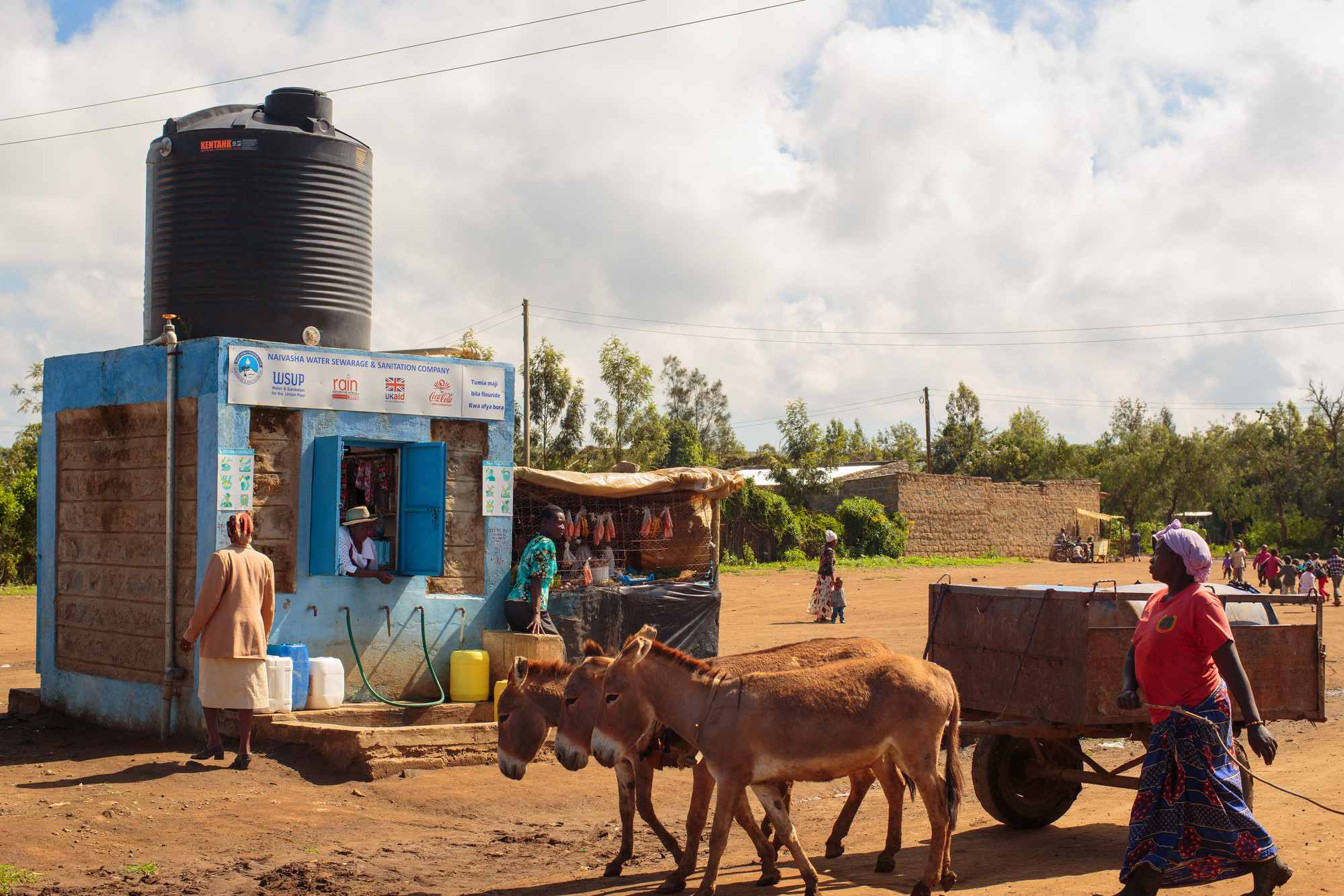 Water kiosk operator in Naivasha_ Kenya